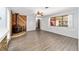 Living room with hardwood floors and a wood burning fireplace at 5640 Se 21St Ln, Ocala, FL 34480