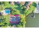 Overhead shot showcases the pool, tennis courts, boat ramp, and waterfront views at 624 Maple Oak Cir # 108, Altamonte Springs, FL 32701