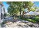 Private backyard with patio and mature landscaping at 624 Maple Oak Cir # 108, Altamonte Springs, FL 32701
