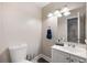 Small half bathroom with updated vanity and toilet at 624 Maple Oak Cir # 108, Altamonte Springs, FL 32701