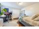 Bright bedroom with a comfortable bed, workspace, and ample closet space at 624 Maple Oak Cir # 108, Altamonte Springs, FL 32701