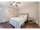 Bright bedroom with ceiling fan and wood flooring at 624 Maple Oak Cir # 108, Altamonte Springs, FL 32701