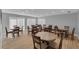 Spacious community room with multiple tables and chairs offers a place for gatherings at 624 Maple Oak Cir # 108, Altamonte Springs, FL 32701