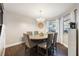 Round dining table with six chairs in a bright room at 624 Maple Oak Cir # 108, Altamonte Springs, FL 32701