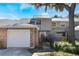 Brick townhome with attached garage and fenced-in patio at 624 Maple Oak Cir # 108, Altamonte Springs, FL 32701