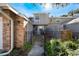 Front entrance of a townhome with a walkway and small patio at 624 Maple Oak Cir # 108, Altamonte Springs, FL 32701