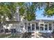 Rear house view, showing a two story home with sunroom and patio at 624 Maple Oak Cir # 108, Altamonte Springs, FL 32701