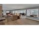 Bright living room boasts an open floorplan with wood floors and an abundance of natural light at 624 Maple Oak Cir # 108, Altamonte Springs, FL 32701