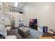 Bright living room with high ceiling, hardwood floors, and comfortable seating at 624 Maple Oak Cir # 108, Altamonte Springs, FL 32701