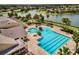 Community pool and clubhouse aerial view at 8592 Hempstead Way, Mount Dora, FL 32757
