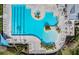 Community pool and clubhouse top-down view at 8592 Hempstead Way, Mount Dora, FL 32757