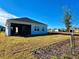 Newly constructed home with a large backyard and screened patio at 8592 Hempstead Way, Mount Dora, FL 32757