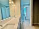 Elegant bathroom with double vanity and large shower at 8592 Hempstead Way, Mount Dora, FL 32757
