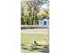 Lawn view through window at 91 Locust Loop, Ocala, FL 34472