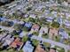 Aerial view of a house and surrounding neighborhood at 16914 Se 96Th Chapelwood Cir, The Villages, FL 32162