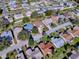 Aerial view of single-Gathering home in residential neighborhood at 16914 Se 96Th Chapelwood Cir, The Villages, FL 32162