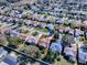 Aerial view of a house and surrounding neighborhood at 16914 Se 96Th Chapelwood Cir, The Villages, FL 32162