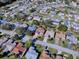 Aerial view of a house and surrounding neighborhood at 16914 Se 96Th Chapelwood Cir, The Villages, FL 32162