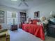 Bedroom with a daybed, two large teddy bears, and a bookcase at 16914 Se 96Th Chapelwood Cir, The Villages, FL 32162
