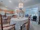 Dining area with a round table and view of the kitchen at 16914 Se 96Th Chapelwood Cir, The Villages, FL 32162