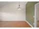 Dining area with wood flooring and an accent wall at 221 Brookdale Loop, Clermont, FL 34711