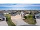 Aerial view of a single-Gathering home with a pool and solar panels at 3113 Sweetgum St, The Villages, FL 32163