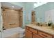 Updated bathroom with tiled shower and granite countertop vanity at 3113 Sweetgum St, The Villages, FL 32163