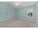 Light and airy bedroom with ceiling fan and neutral carpeting at 3113 Sweetgum St, The Villages, FL 32163