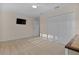 Bedroom featuring a large closet and wall-mounted TV at 3113 Sweetgum St, The Villages, FL 32163