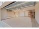 Spacious garage with epoxy floor and built-in storage at 3113 Sweetgum St, The Villages, FL 32163