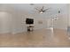 Bright living room featuring tile floors and a ceiling fan at 3113 Sweetgum St, The Villages, FL 32163