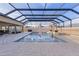 Resort-style pool with covered patio, fire pit and lounge chairs at 3113 Sweetgum St, The Villages, FL 32163