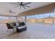 Covered patio with seating and a view of the pool at 3113 Sweetgum St, The Villages, FL 32163
