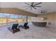 Covered patio with comfortable seating and pool view at 3113 Sweetgum St, The Villages, FL 32163