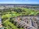 Beautiful aerial view of the home's location on a golf course at 3213 Archer Ave, The Villages, FL 32162