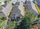 Stunning aerial view of the home showcasing its pool, backyard, and roof at 3213 Archer Ave, The Villages, FL 32162