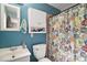 Small bathroom with shower/tub combo at 505 W Catawba St, Fruitland Park, FL 34731