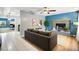 Comfortable living room with a fireplace and neutral decor at 505 W Catawba St, Fruitland Park, FL 34731