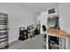 Organized garage space featuring storage units, a work bench, and tool storage at 9249 Ivywood St, Clermont, FL 34711
