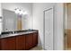 Double vanity bathroom with granite countertops and a separate shower at 1018 Green Gate Blvd, Groveland, FL 34736