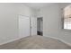 Bright bedroom with carpet flooring and double door closet at 1018 Green Gate Blvd, Groveland, FL 34736