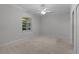 Bright bedroom with neutral walls and carpet flooring at 1018 Green Gate Blvd, Groveland, FL 34736