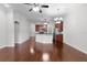 Spacious room includes the open kitchen concept and hardwood floors at 1018 Green Gate Blvd, Groveland, FL 34736