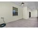 Covered patio featuring tile flooring and neutral walls at 1018 Green Gate Blvd, Groveland, FL 34736