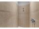 Tiled walk-in shower featuring modern fixtures and neutral colors at 1018 Green Gate Blvd, Groveland, FL 34736
