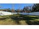 Fenced backyard with lush lawn at 1710 Summer Rose Dr, Mount Dora, FL 32757