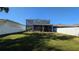 Expansive backyard offering a peaceful setting with a manicured lawn and serene atmosphere at 1710 Summer Rose Dr, Mount Dora, FL 32757