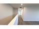 Hallway leading to the bedrooms and bathrooms at 1710 Summer Rose Dr, Mount Dora, FL 32757