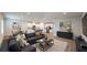 Spacious open concept living room and kitchen with modern furnishings and decor at 1710 Summer Rose Dr, Mount Dora, FL 32757