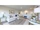Beautiful living room with bright decor and plenty of natural light to create a cozy space at 1710 Summer Rose Dr, Mount Dora, FL 32757